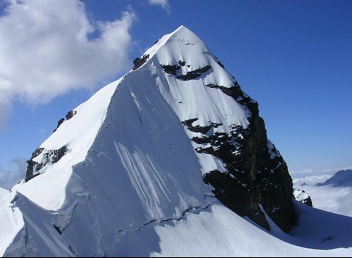 Bolivia - Pequeno Alpamayo summit ridge distant.jpg